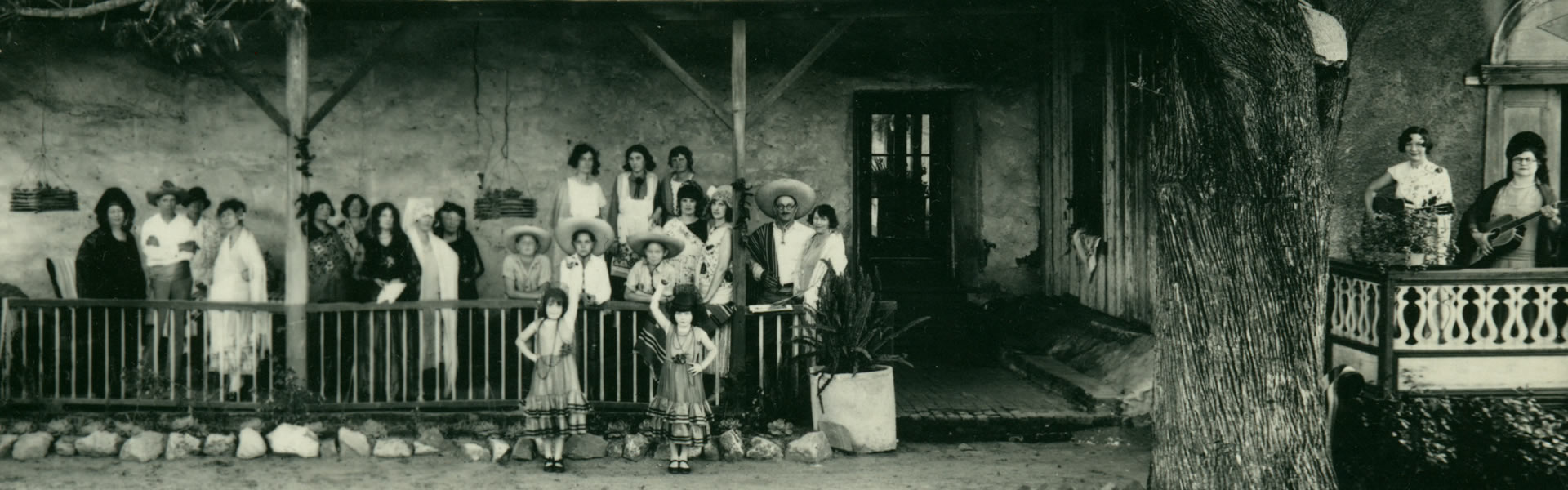 Group standing in front of Historic Pio Pico mansion.